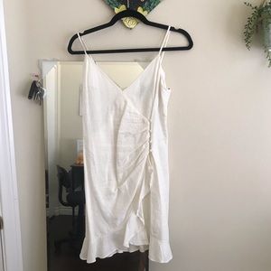 white body on buttoned dress